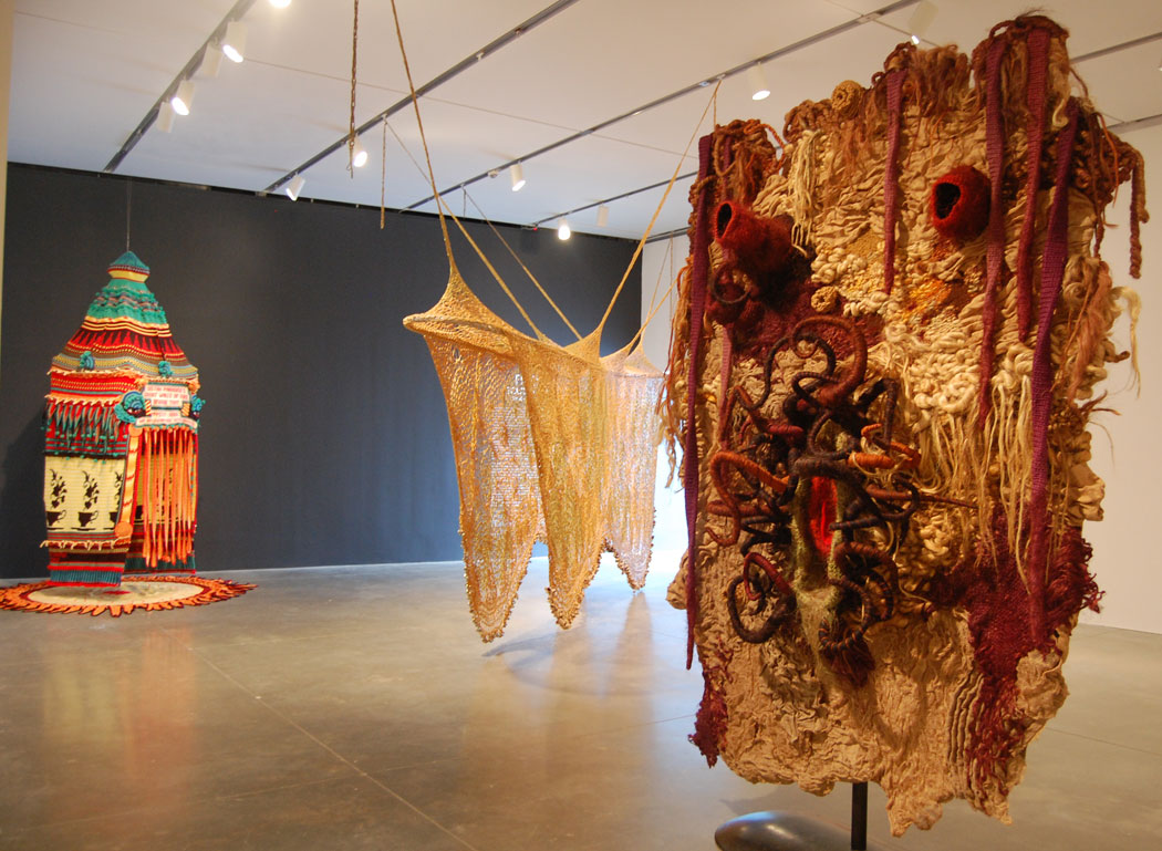 From left, Xenobia Bailey's 1993-2009 "Sistah Paradise's Great Wall of Fire Revival Tent"; Ernesto Neto's 2012 "SoundWay"; and Piotr Uklanski's 2012 "Untitled (Femmage)." (Greg Cook)