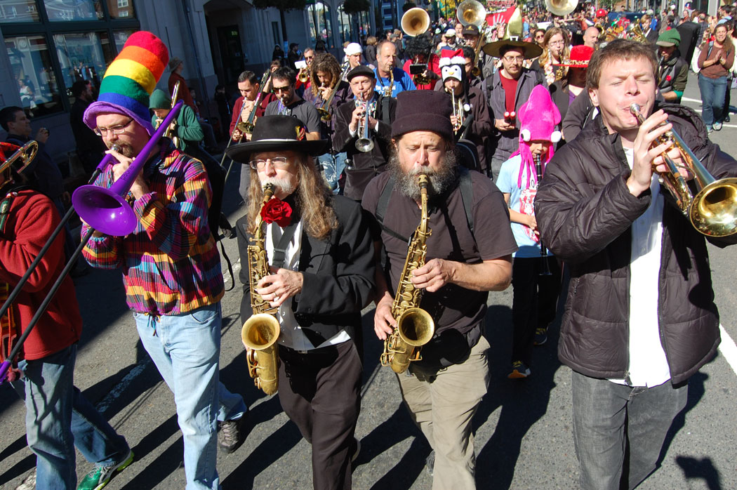 Ron Kelley (center with rose) performs with the Bread and Puppet Circus Band from Vermont. (Greg Cook)