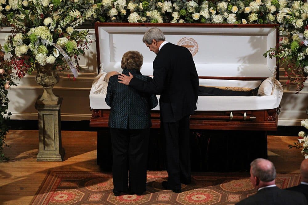 U.S. Secretary of State John Kerry, right, and Angela Menino, widow of former Boston Mayor Tom Menino, stand at the casket as Menino lies in state at Faneuil Hall. (Suzanne Kreiter (AP Photo/The Boston Globe)