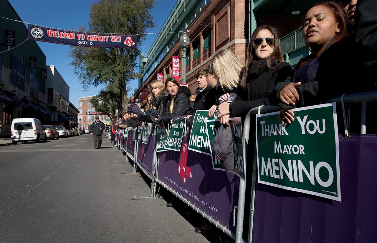 Mourners line Yawkey Way waiting for Thomas Menino's funeral procession to drive by. (Robin Lubbock/WBUR)