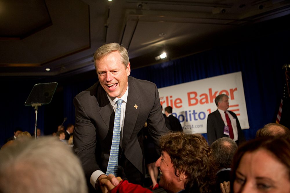 Charlie Baker greets supporters at his Election Night victory party in Boston. (Jesse Costa/WBUR)