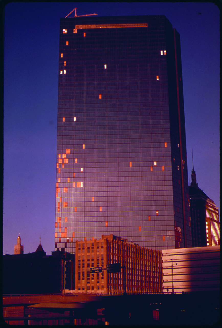 Plywood panels on the John Hancock Tower, which began to lose its panes of glass shortly after construction. Back Bay, 1973. (Courtesy National Archives)