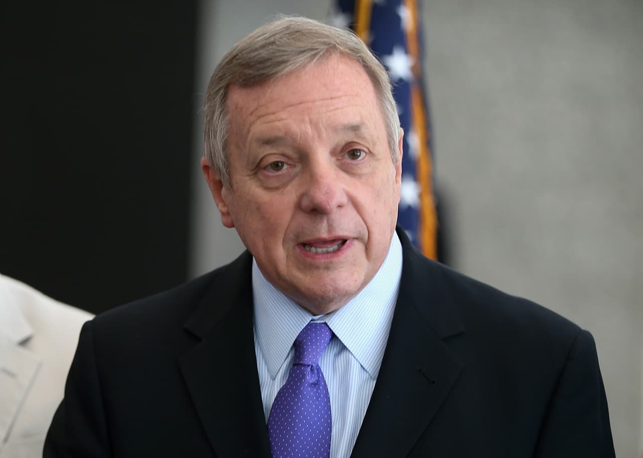 Rep. Luis Gutierrez (D-IL) (L) listens as then-Senate Assistant Majority Leader Dick Durbin (D-IL) speaks about the need for immigration reform during a press conference following a meeting with Homeland Security Secretary Jeh Johnson Dirksen Federal Building on June 13, 2014 in Chicago, Illinois. (Scott Olson/Getty Images)