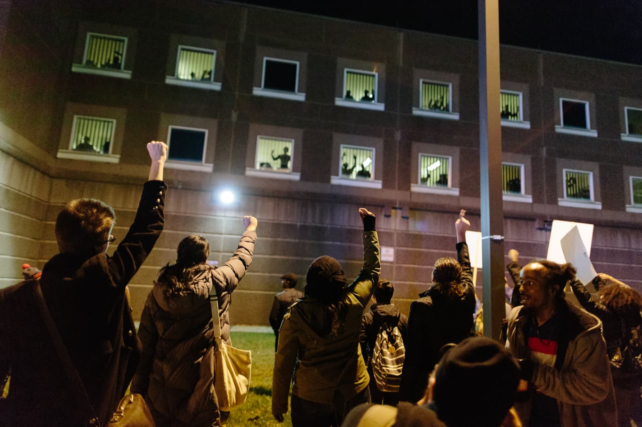 An estimated crowd of 1,400 protesters walked to the South Bay Corrections facility during their march in solidarity with protesters in Ferguson, Mo. (Joe Spurr/WBUR)