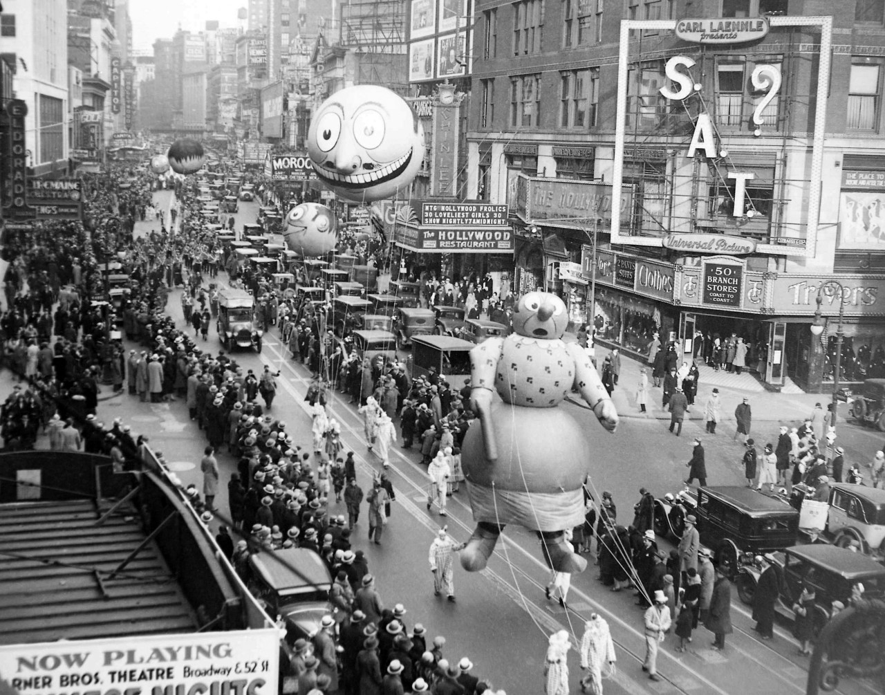 The Macy's Thanksgiving Day Parade passes down Broadway in 1930.  The parade's first giant balloons debuted in 1927. (AP)