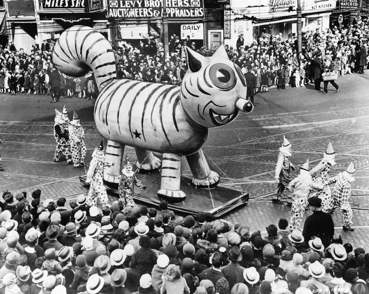 A float of a big cat makes its way down a street during the 1931 Thanksgiving Day Parade in New York City.  (AP)
