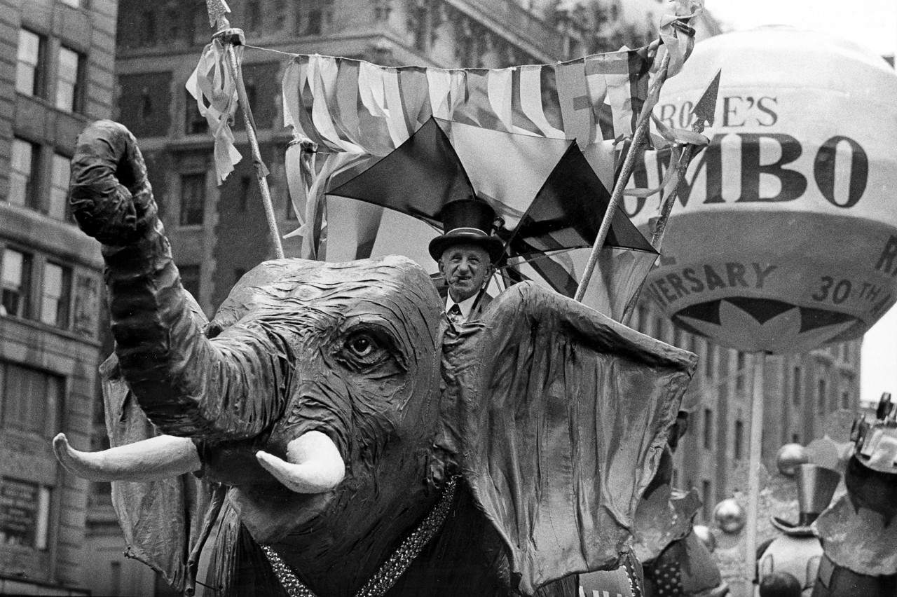 Comedian Jimmy Durante rides on a Jumbo the elephant float during the 1962 parade. (AP)