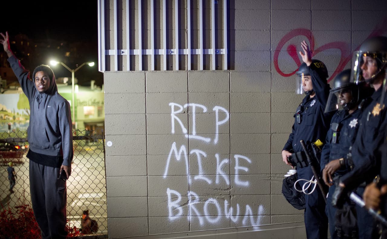 A protester in Oakland, Calif. (Noah Berger/AP)