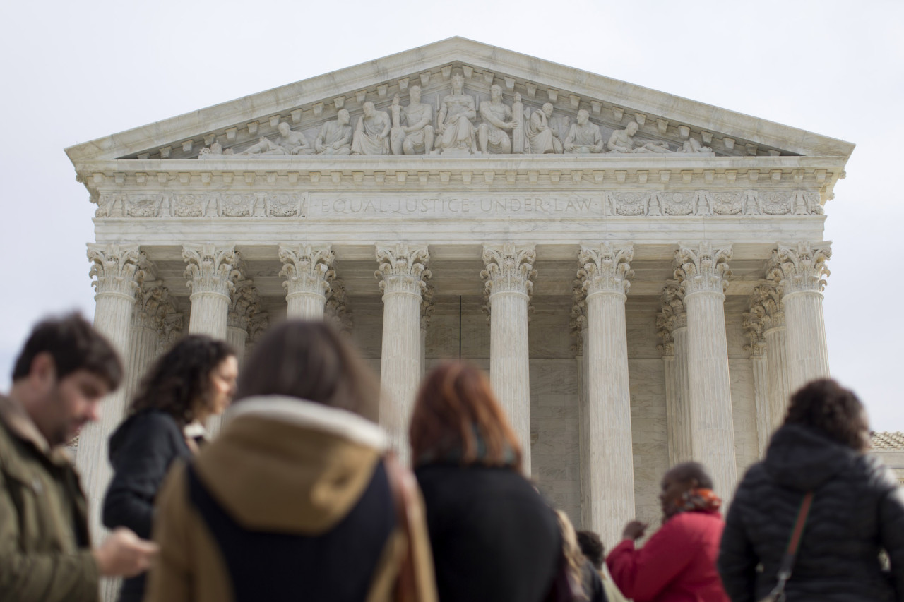 People wait outside to enter the U.S. Supreme Court in Washington, Monday, Nov. 3, 2014. (AP)