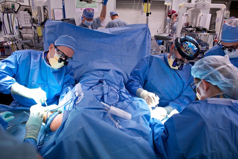 A team of surgeons perform Will's bilateral arm transplant (Lightchaser photography courtesy of Brigham and Women's Hospital)