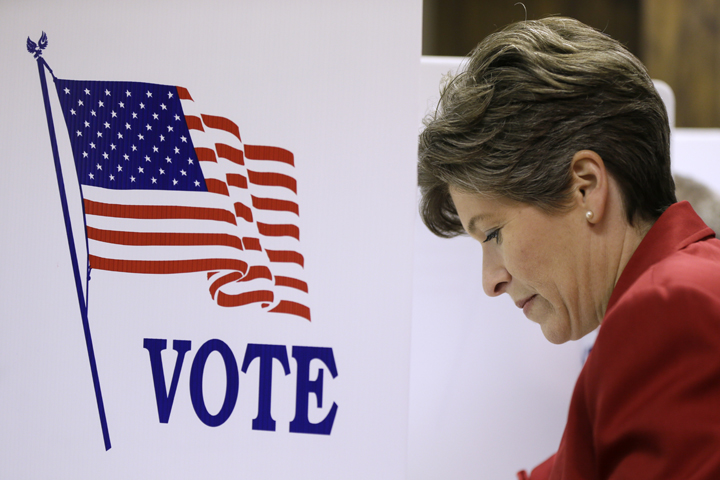 Republican Senate candidate State Sen. Joni Ernst casts her ballot in the general election, Tuesday, Nov. 4, 2014, in Red Oak, Iowa. Ernst is running against Democrat U.S. Rep. Bruce Braley for the U.S. Senate seat of Tom Harkin, who is not seeking reelection.  (AP)