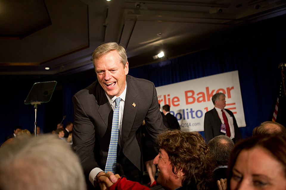 Gov.-elect Charlie Baker greets supporters at his election night rally in Boston. (Jesse Costa/WBUR)