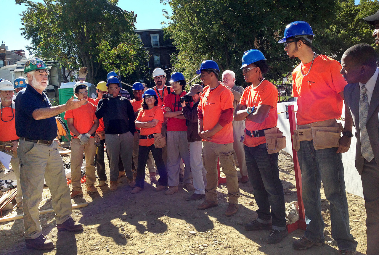 Madison Park seniors are building a house from the foundation up in Roxbury. (Delores Handy/WBUR)