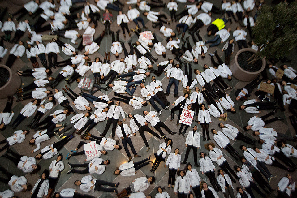 Some 100 Harvard Medical School students protest the deaths of unarmed black men at the hands of police as well as racial inequality in medical treatment. (Jesse Costa/WBUR)