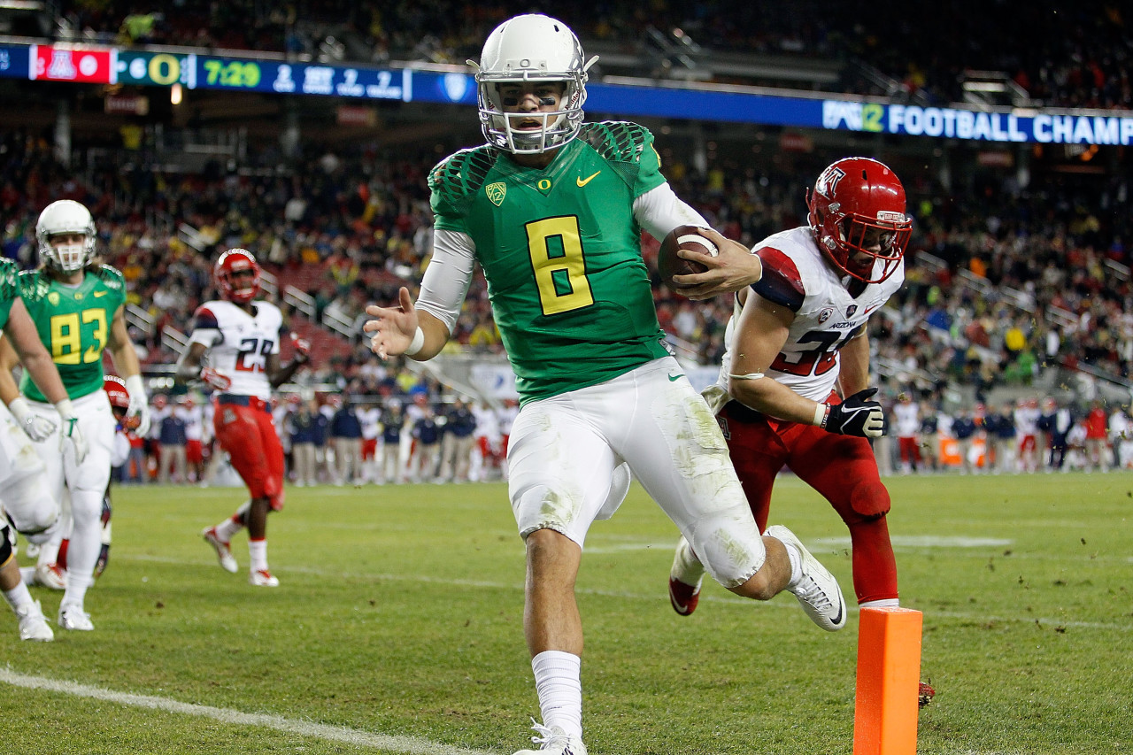 "Whatever weaknesses Oregon has, Marcus Mariota is able to transcend them," Matt Hinton says of the Ducks' star quarterback. (Brian Bahr/Getty Images)