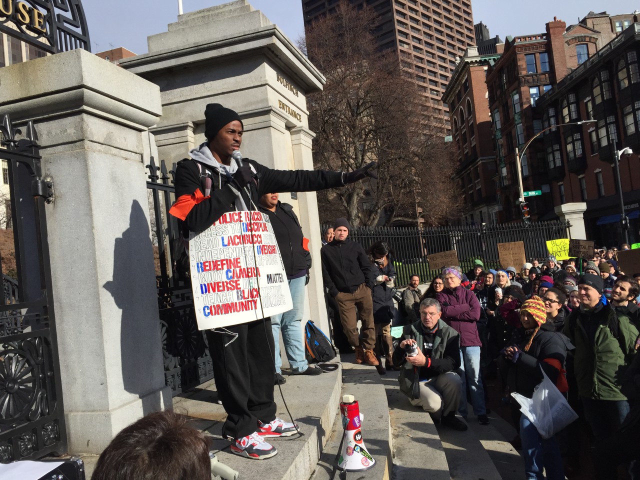 Martin Henson leads a chant of "black lives matter." (Bruce Gellerman/WBUR)