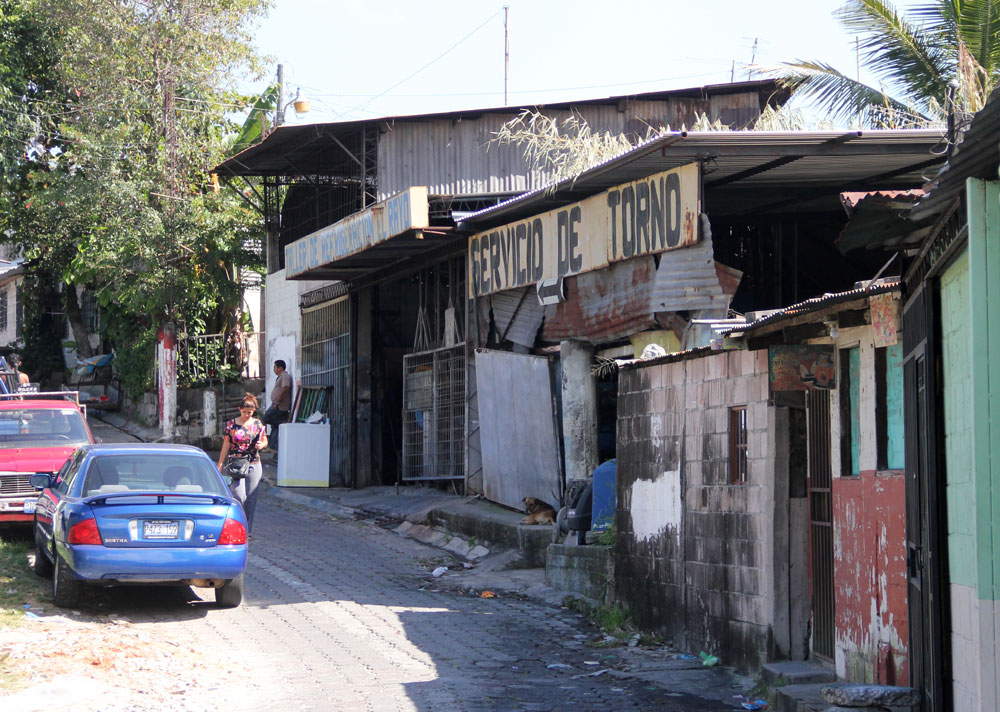 A street scene from the gritty city of Mejicanos, El Salvador (Shannon Dooling/WBUR)