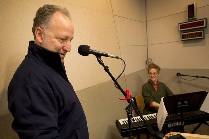 David Coffin and Megan Henderson of the Revels in the On Point studio on December 24, 2014. (Robin Lubbock / WBUR)