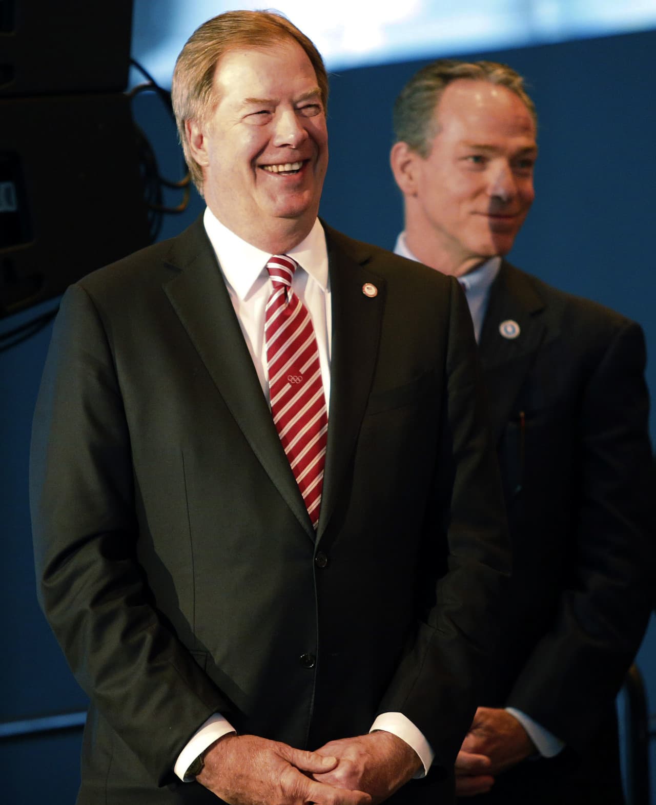 USOC Chairman of the Board Larry Probst, left, and John Fish, Boston's bid chairman and head of the local Suffolk Construction firm, smile during the news conference. (Winslow Townson/AP)