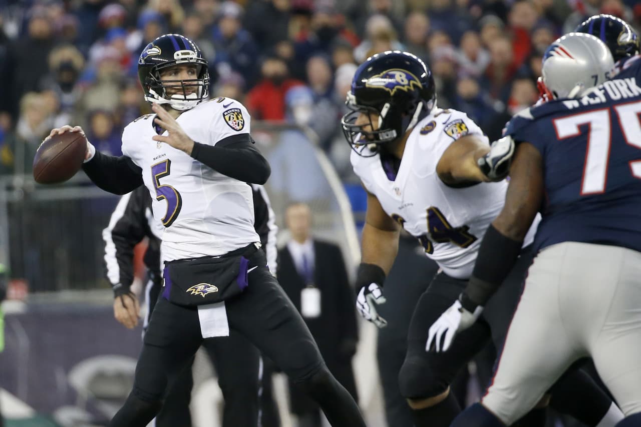 Baltimore Ravens quarterback Joe Flacco (5) passes against the New England Patriots in the first half. (Elise Amendola/AP)