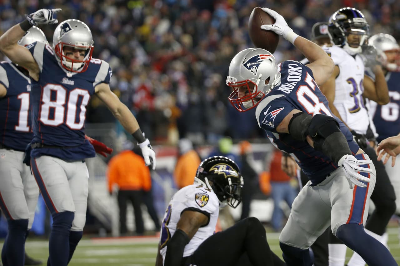 New England Patriots tight end Rob Gronkowski (87) celebrates his touchdown catch in the second half. (Elise Amendola/AP)