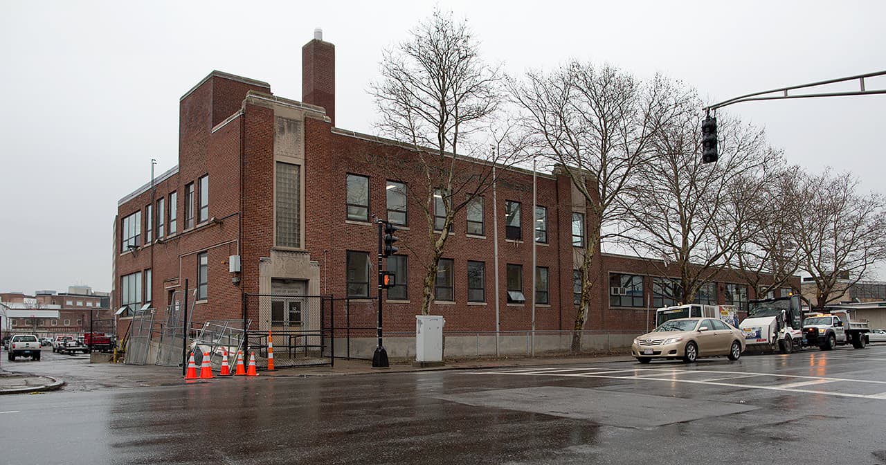 Initial renovations on the old city transportation building were estimated at $2 million, but it could take millions more to reach the eventual goal of 490 beds. (Robin Lubbock/WBUR)