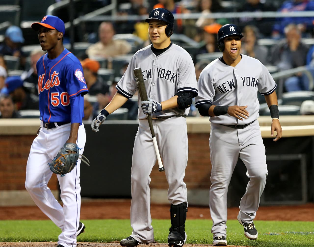 Thanks to interleague play, New Yorkers don't have to wait for both teams to make the World Series to watch the Yankees play the Mets. (Elsa/Getty Images)