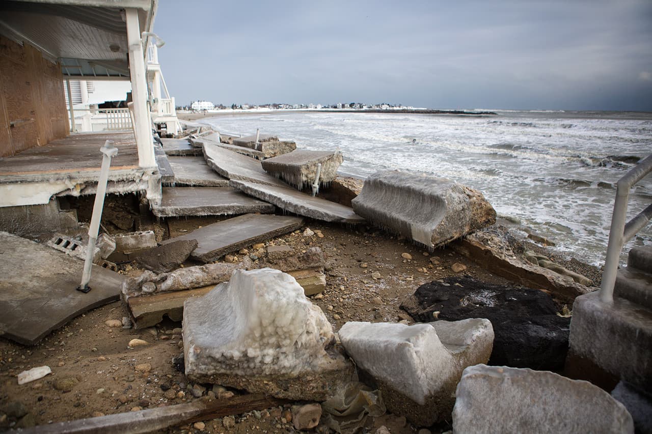 The breached wall at Brant Rock in Marshfield. (Jesse Costa/WBUR)