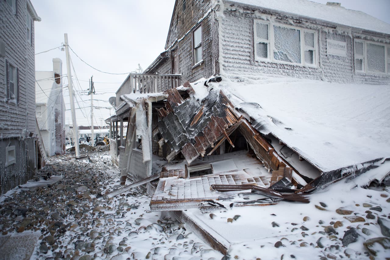 A house damaged in the Brandt Rock area of Marshfield. (Jesse Costa/WBUR)