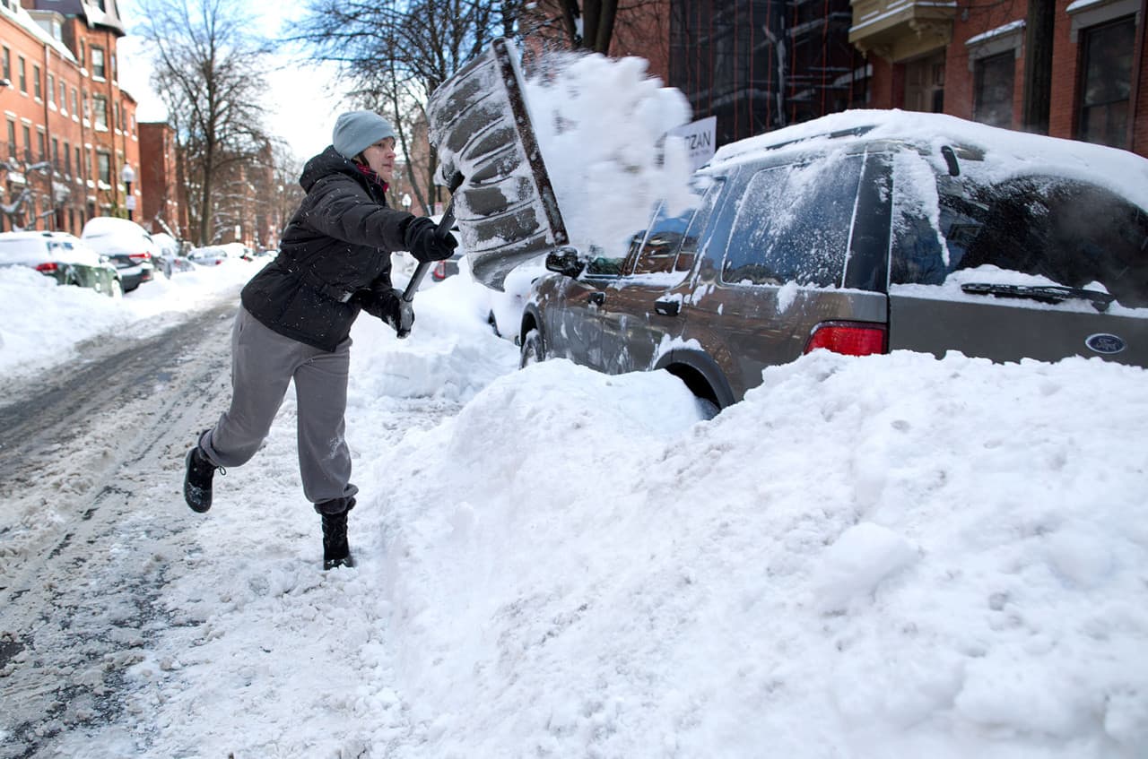 People in South Boston use random items to claim public parking spots after  winter storms 