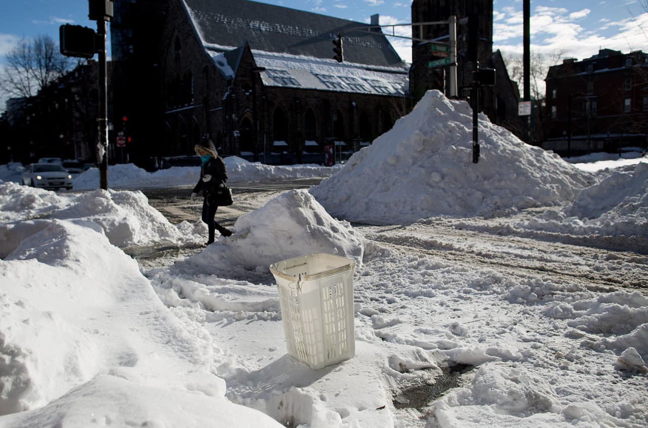 People in South Boston use random items to claim public parking spots after  winter storms 