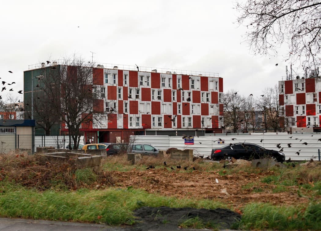 Some of the buildings in the Grand Borne neighborhood of Grigny, France, a southern suburb of Paris. Police who work in the complex, which houses 11,000 people, say the arrangement of buildings creates a fortress for drug traffickers and other criminals and makes patrolling the area difficult and sometimes dangerous. (Thibault Camus/AP)