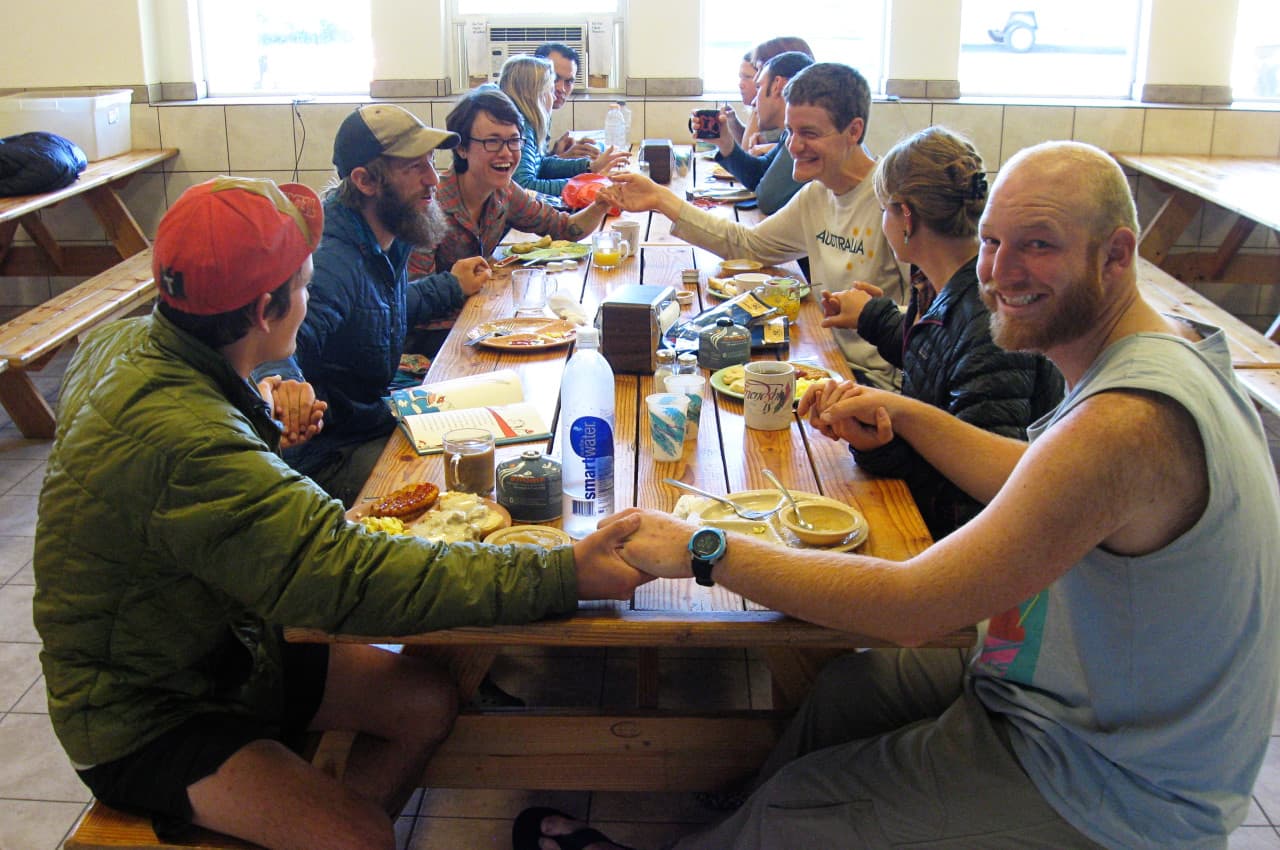 Dry hikers giving thanks before dinner. (Courtesy Brittany Goodson)
