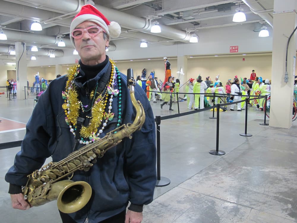 Mark Chenevert plays the saxophone with the Hot Tamale Brass Band. (Zoe Sobel/WBUR)