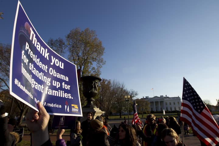Supporters of immigration reform attend a rally in front of the White House in Washington, Friday, Nov. 21, 2014, thanking President Obama for his executive action on illegal immigration. (AP)