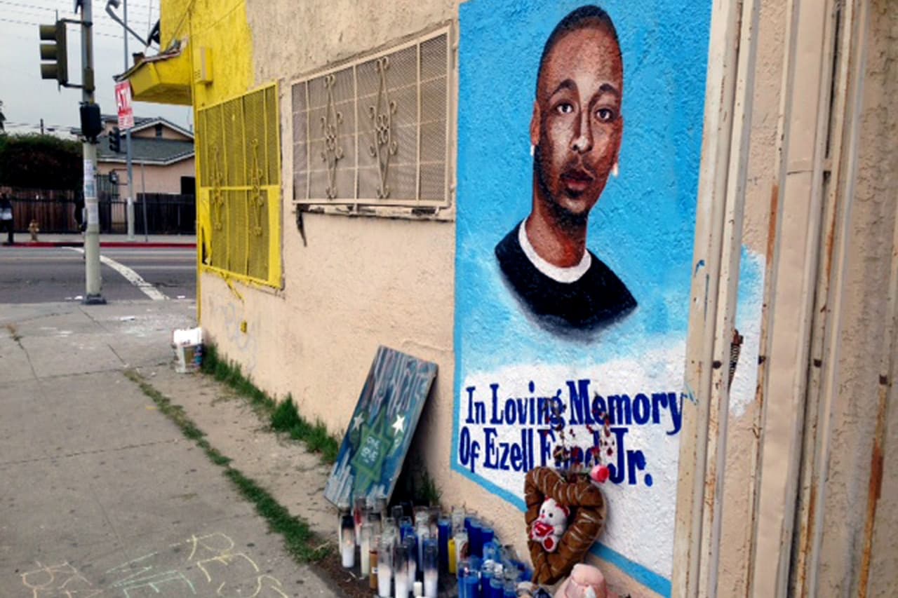 This Tuesday, Dec. 30, 2014 a street side memorial with a painted portrait of Ezell Ford near where he was shot when police confronted him on Aug. 11, 2014, on a street near his home in South Los Angeles. (AP)
