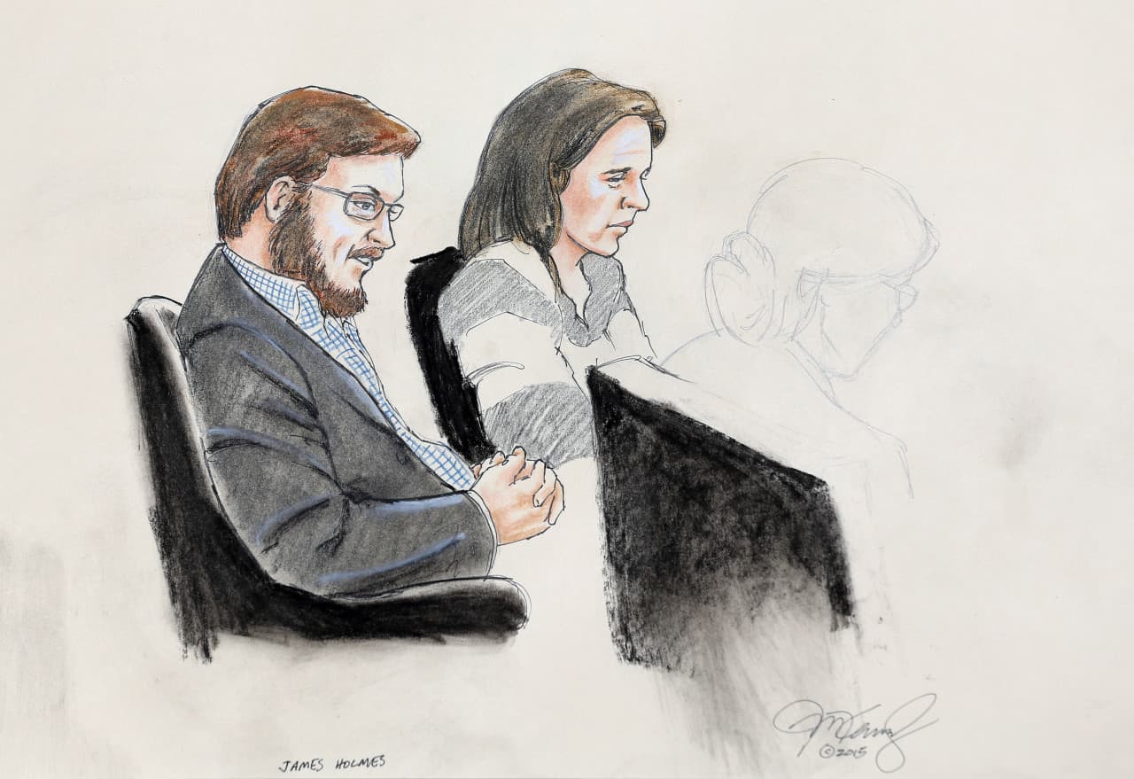 In this courtroom sketch, James Holmes, left, and defense attorney Tamara Brady are depicted, as they sit in court on the first day of jury selection in Holmes&#039; trial Tuesday, Jan. 20. (Jeff Kandyba/AP)