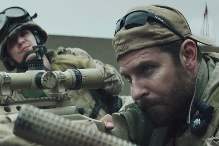 In the new film "American Sniper," Bradley Cooper plays real-life US Navy Seal Chris Kyle, who was the deadliest marksman in American history. (Courtesy Warner Bros. Pictures)
