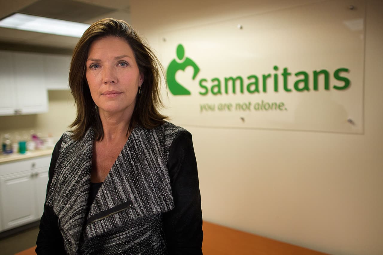 Debbie DiMasi is director of grief support services at Samaritans in Boston. She's also lost family members to suicide. (Jesse Costa/WBUR)