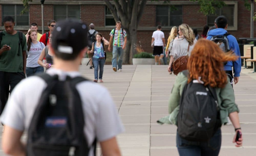 Students walk through the UMass Amherst campus. (Andrew Phelps/WBUR)