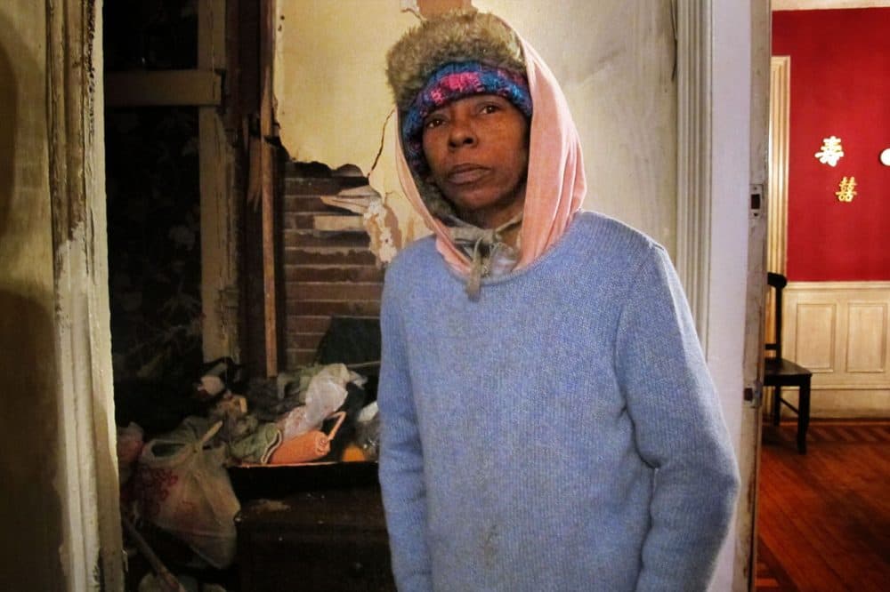 An oil tank in Robbin Taylor’s basement is empty and she has no money to fill it. The $900 in oil assistance she received at the beginning of winter is long gone. (Martha Bebinger/WBUR)