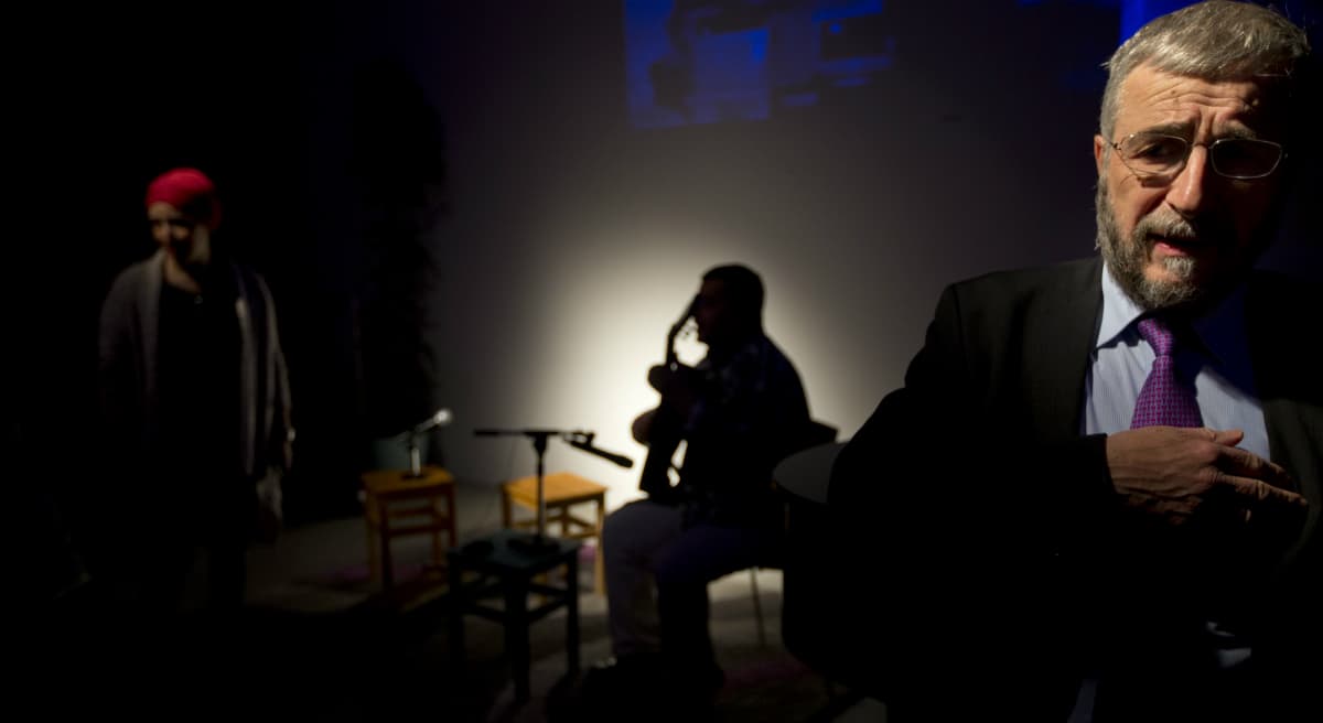 Pictured: Orthodox Jewish Rabbi Lody van de Kamp, right, and Labor Party Muslima Fatima Elatik, left, wait for the start of a gathering where Jews and Muslims commemorated the victims and relatives of the recent terror attacks during a gathering of the Salaam-Shalom organization in Amsterdam, Netherlands, Tuesday, Jan. 20, 2015. (Peter Dejong/AP)