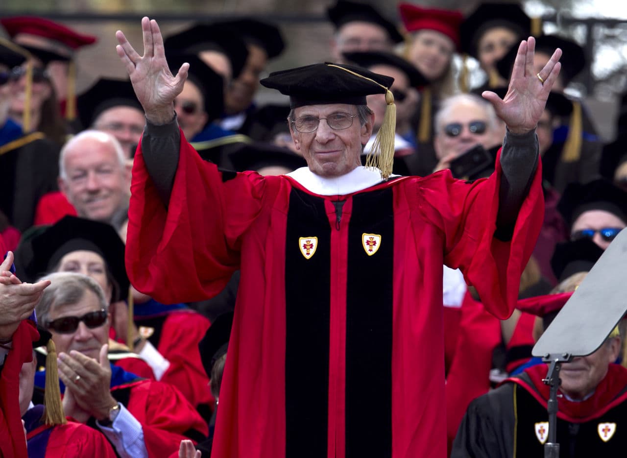 Actor Leonard Nimoy gives the Vulcan salute after being awarded an honorary Doctor of Humane Letters degree during Boston University's 2012 commencement. (Steven Senne/AP)