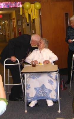 The Kiss: Polly Deihl and her significant other, John, share a kiss on her 102nd birthday. (Marcia Deihl/Courtesy)