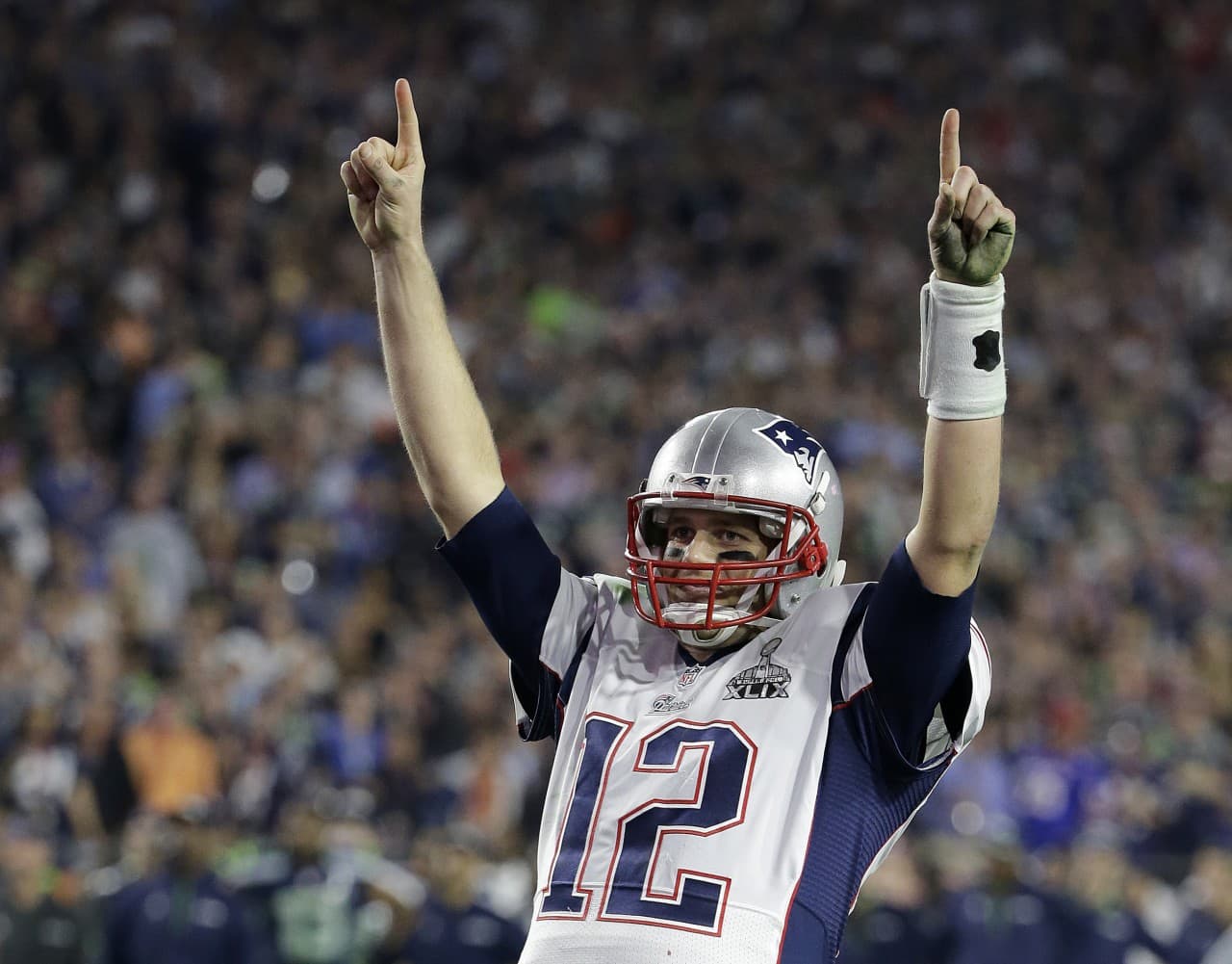 New England Patriots quarterback Tom Brady (12) celebrates during the second half of Super Bowl XLIX. (Kathy Willens/AP)