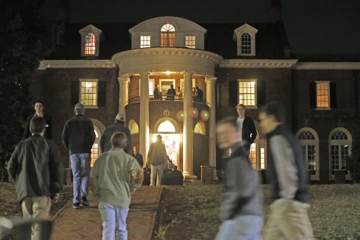 In this Thursday, Jan. 15, 2015 photo, University of Virginia students walk to fraternities at the start of rush week at the University of Virginia in Charlottesville, Va. (AP)