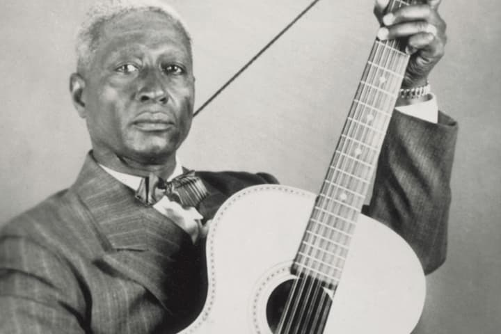 This image released courtesy of the Lead Belly Estate shows folk and blues musician Huddie William Ledbetter, better known as Lead Belly. Huddie "Lead Belly" Ledbetter never had a hit record before he died of Lou Gehrig's disease in 1949. (AP)