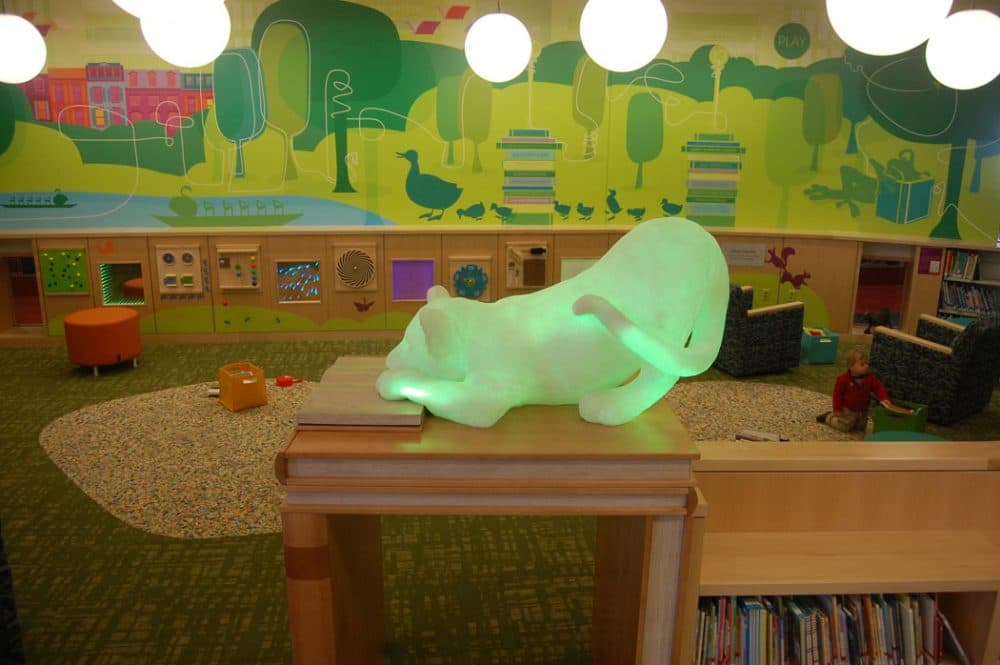 It has this really cool sensory wall in it,” Colford says of the Children’s Library. “It’s really about tactile and visual and things to stimulate the senses. They’re really good for our youngest users and kids with autism or other learning disabilities.” The mural depicts the Boston Public Garden and the avian family from Robert McCloskey’s 1941 picture book “Make Way for Ducklings.” (Greg Cook)
