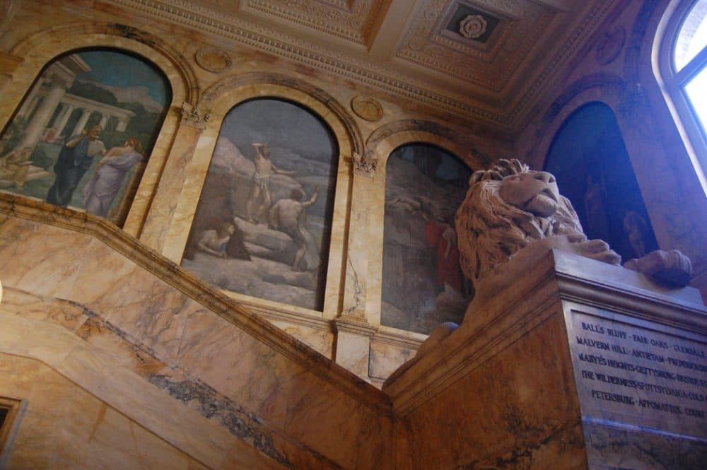 Lions—monuments to the Civil War—flank the main stairway in the 1895 McKim Building. (Greg Cook)