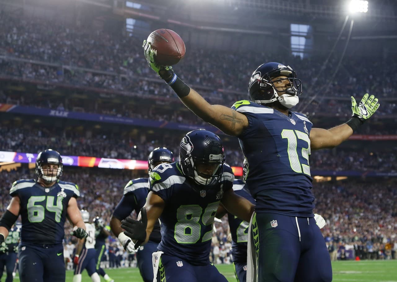 Seahawks wide receiver Chris Matthews caught a touchdown with 2 seconds left in the first half to even the score at 14 going into the break. (Matt York/AP)